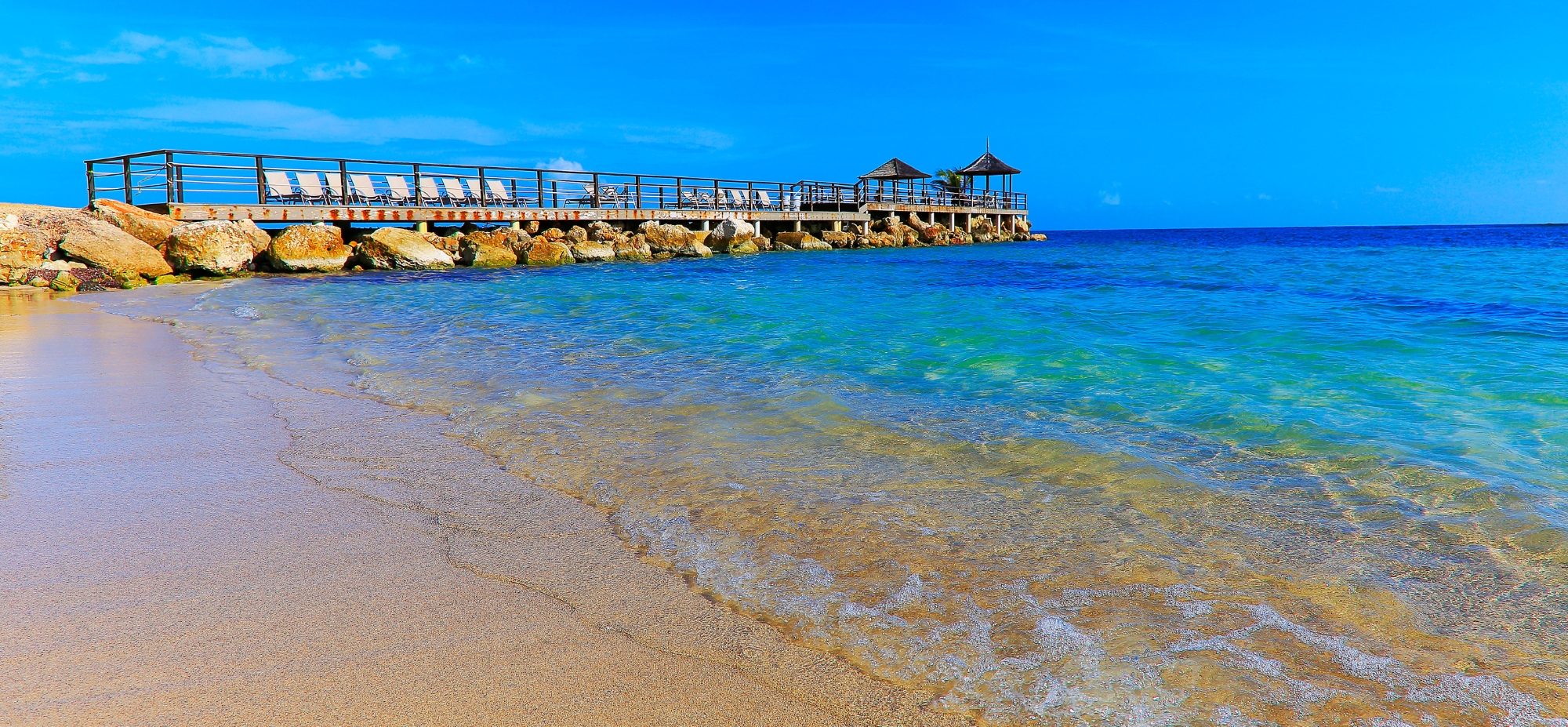 A jetty sticks out into the ocean near Boca Raton, Florida, where Gerardi Wealth Management has their offices
